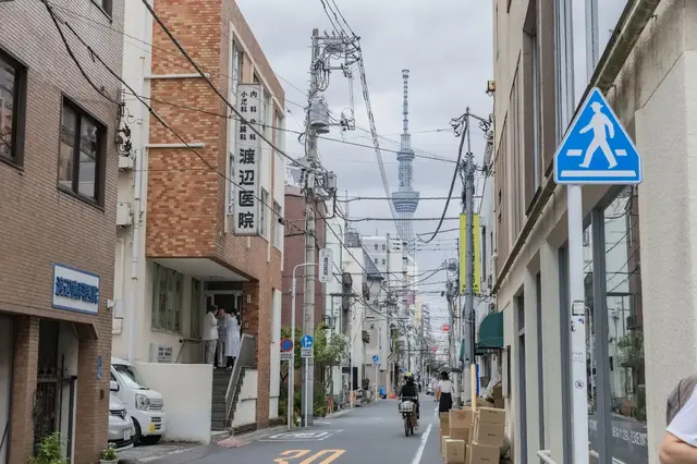 Tokyo Skytree framed by a quiet street near Kappabashi