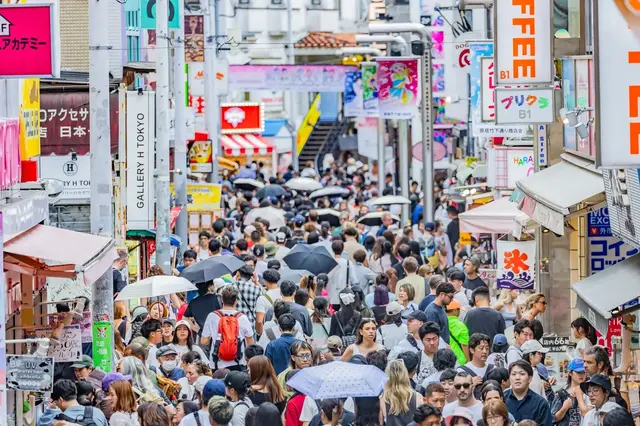 Crowds and colourful shop signs on Takeshita Street in Harajuku