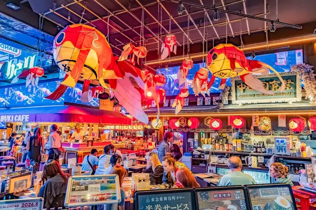 Brightly decorated food hall with lanterns and colourful installations in Shinjuku