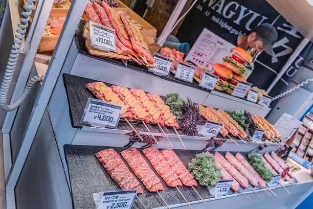 Display of meat skewers and grilled food at Tsukiji