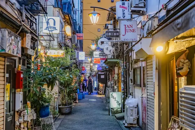 Golden Gai bar alleys illuminated at dusk in Shinjuku