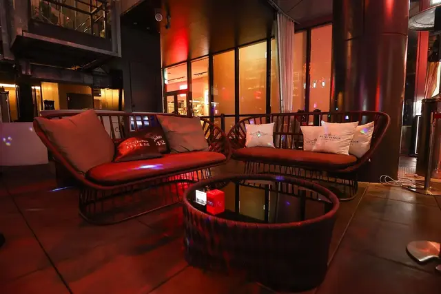 Warm light and lounge seating — a quieter setting for conversation.